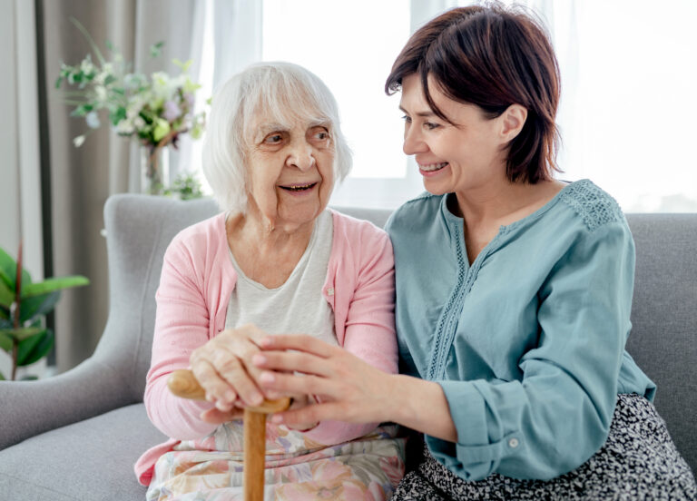 senior woman and adult woman sitting comfortably 2026 01 09 09 25 46 utc