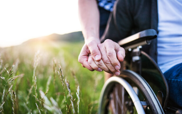 helping hands outdoors in rural setting at sunset 2026 03 10 03 06 57 utc